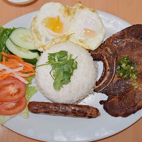 C9. Charbroiled Pork Chop, Chinese Sausage, Sunny Side Egg on Steamed Broken Rice C9. Charbroiled Pork Chop, Chinese Sausage, Sunny Side Egg on Steamed Broken Rice